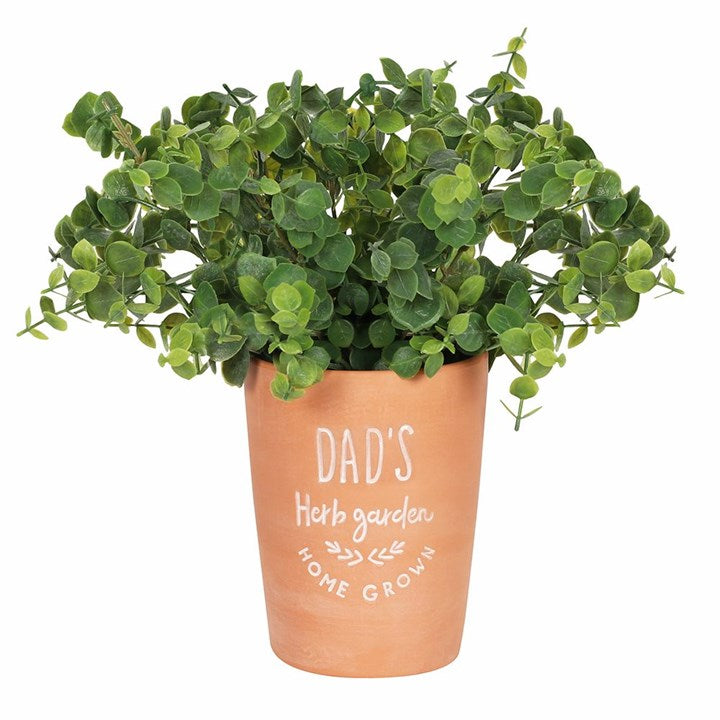 Image of a terracotta plant pot with the words 'Dad's Herb Garden' engraved in the front. This is a great gardening gift for dad.