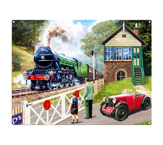 A vintage metal sign featuring the famous steam locomotive, the flying scotsman with a boy and his father watching the crossing.